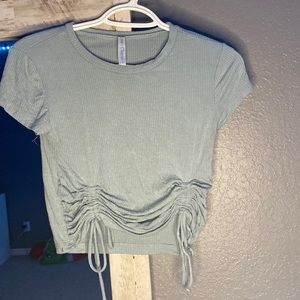Light blue cropped side-ties shirt